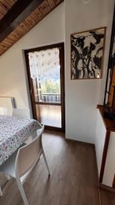 Postel nebo postele na pokoji v ubytování Silvydolomitiapartment