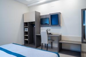 A bed or beds in a room at San Lorenzo - Boutique Hotel & SPA