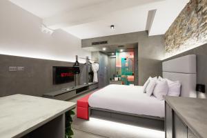 Llit o llits en una habitació de David Hotel