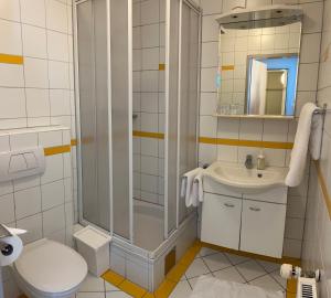 Koupelna v ubytování Pension Kaiserhof + 8 fotografií