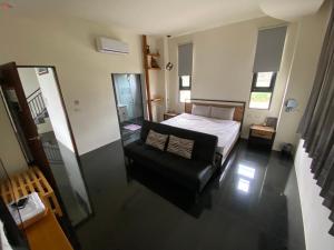 Postel nebo postele na pokoji v ubytování 晨民宿 Morning Homestay + 12 fotografií