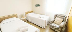 Postel nebo postele na pokoji v ubytování Apartamento Estrella del Mar by DENIA COSTA