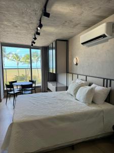 Ένα ή περισσότερα κρεβάτια σε δωμάτιο στο Setai Yacht Beira Mar