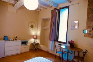 Postel nebo postele na pokoji v ubytování Fiol Masia Verano + 3 fotografie