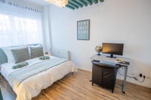 Postel nebo postele na pokoji v ubytování Modernes Stadt Apartment Traum Quartier