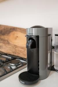 a coffee maker sitting on top of a stove at Cabo San Lucas House, 2Bedroom, 2Bathrooms,Pool, Rooftop views in El Pueblito