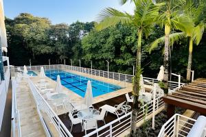 Πισίνα στο ή κοντά στο Apartamento em Riviera - SP (3)