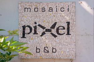 Certifikát, hodnocení, plakát nebo jiný dokument vystavený v ubytování Pixel b&b