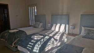 Postel nebo postele na pokoji v ubytování Wytchwood B&B