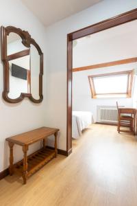 Postel nebo postele na pokoji v ubytování Hotel Cabeza