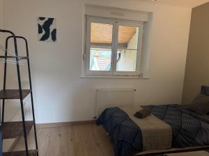 Ένα ή περισσότερα κρεβάτια σε δωμάτιο στο Le trente 30