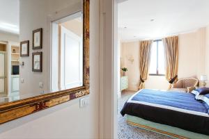 Posteľ alebo postele v izbe v ubytovaní Deluxe Apartments Lagoon View