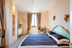 Posteľ alebo postele v izbe v ubytovaní Deluxe Apartments Lagoon View