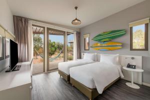 TV a/nebo společenská místnost v ubytování Radisson Blu Resort Taghazout Bay Surf Village