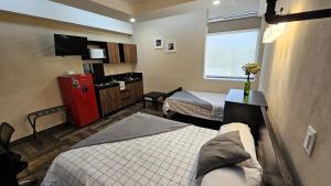 Postel nebo postele na pokoji v ubytování A30 SUITE BLACK PLUS Modernas Suites en Casona Acequia - Confort y Estilo en Cuautitlán Izcalli Tepotzotlán"
