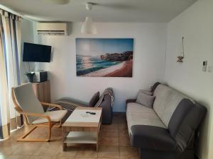 Χώρος καθιστικού στο Apartmani Morska Vila
