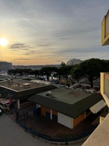 a rooftop view of a city with a building at T3 Rénové vu Port Clim et Wifi in Mauguio