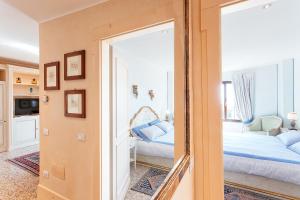 Posteľ alebo postele v izbe v ubytovaní Deluxe Apartments Lagoon View