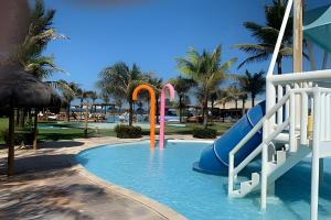 Swimmingpoolen hos eller tæt på Apartamento em Fortaleza - CE