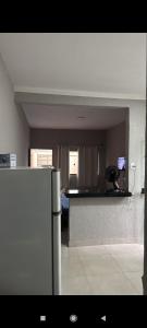 Una cocina o cocineta en Casa de aluguel 3 fotos más