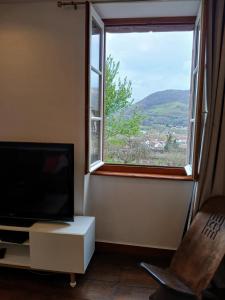 Nespecifikovaný výhled na hory nebo výhled na hory při pohledu z apartmánu + 5 fotografií