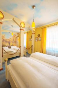 Postel nebo postele na pokoji v ubytování Hotel Plankl
