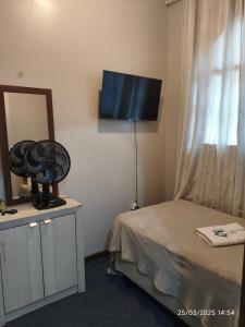 TV a/nebo společenská místnost v ubytování Quarto FIRST CLASS