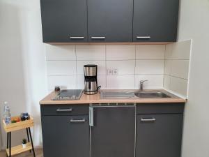 Η κουζίνα ή μικρή κουζίνα στο Hogulu - ruhig gelegenes Appartement 22 in der Altstadt