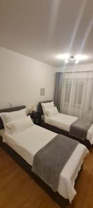 Postel nebo postele na pokoji v ubytování TOP 06