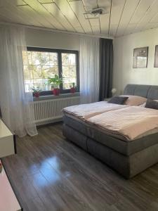 Postel nebo postele na pokoji v ubytování Ferienwohnung Am Schiff in Eberbach