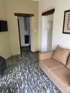 TV a/nebo společenská místnost v ubytování La Casita Yogui