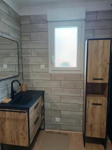 Kuchyň nebo kuchyňský kout v ubytování Gîte Axel'Air