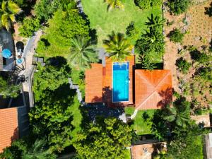 Bazén v ubytování Chácara Novo Mundo nebo v jeho okolí