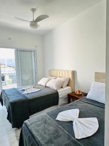 Кровать или кровати в номере LAAR Hotel