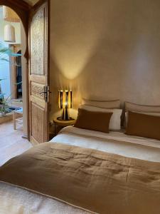 Giường trong phòng chung tại Villa les Portes de l'Atlas - MARRAKECH +55 ảnh