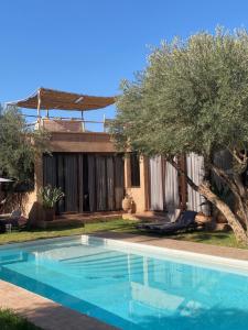 Hồ bơi trong/gần Villa les Portes de l'Atlas - MARRAKECH