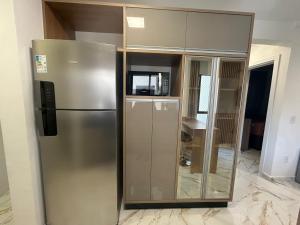 Kuchyň nebo kuchyňský kout v ubytování Apartamento no Crisalidas simplicidade e aconchego