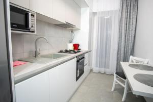 Køkken eller tekøkken på Toka Apartments Luxury Studio