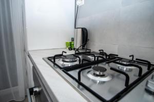 Køkken eller tekøkken på Toka Apartments Luxury Studio + 68 billeder