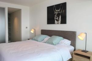 Voodi või voodid majutusasutuse HOM I Espectacular Depto 1D1B, y Estacionamiento Privado PNM 1113 toas