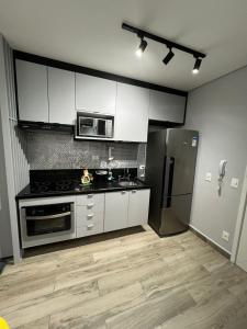 Kuchyň nebo kuchyňský kout v ubytování Apto 1 dorm guarulhos helbor patteo bosque maia 7 min aeroporto