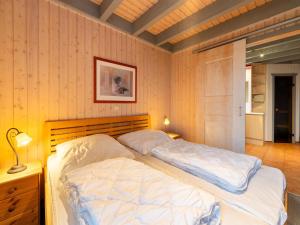 Postel nebo postele na pokoji v ubytování Ferienhaus mit moderner Einrichtung