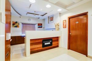 Kuchyň nebo kuchyňský kout v ubytování Super Townhouse Oak Ramdaspeth Downtown