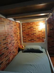 Postel nebo postele na pokoji v ubytování Ở Mô Dalat