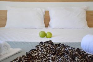Postel nebo postele na pokoji v ubytování Orfeas