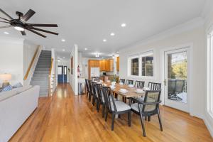 a dining room and living room with a table and chairs at What A View in Terrell