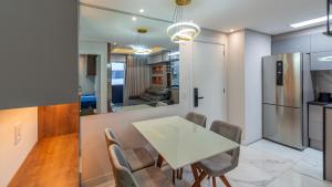 Kuchyň nebo kuchyňský kout v ubytování Apartamento moderno e bem localizado em Canoas!
