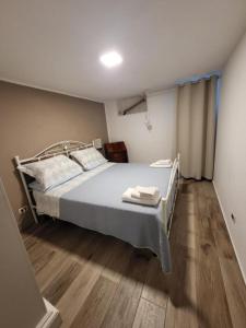 En eller flere senge i et værelse på Casa Villa