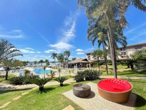 a resort with a red frisbee in a park at View 462 Só para você! in Brasília