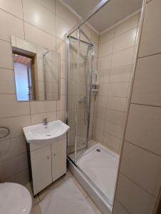 Kúpeľňa v ubytovaní Widok apartamenty,domki,pokoje + 14 fotografií